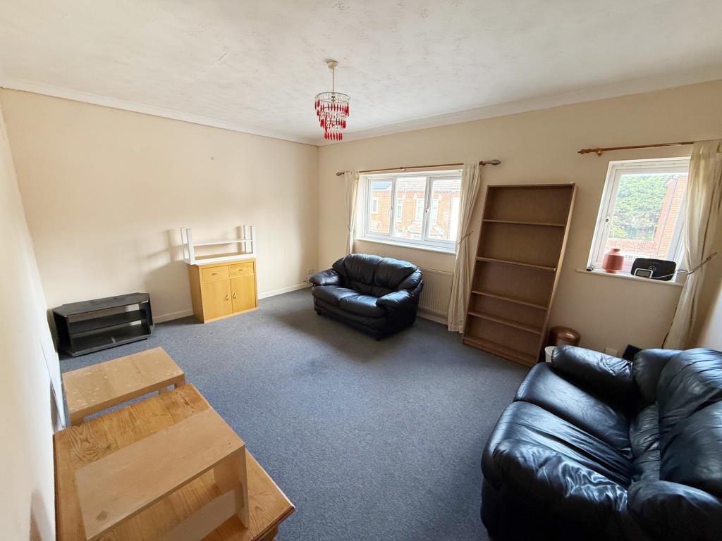 Lot: 44 - FLAT FOR IMPROVEMENT - Living room with carpet and magnolia walls
